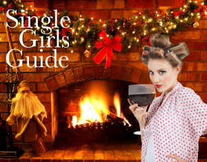 Log fire with Christmas garland and fairylights.
