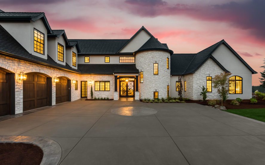 Beautiful,Luxury,Home,Exterior,At,Twilight,With,Colorful,Sunset,Sky - 92.5 The Beat
