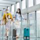Family,With,Two,Children,Going,On,Holiday,,Wearing,Face,Masks - 92.5 The Beat