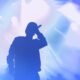 SilhouetteOfRapSingerPerformingOnStageBrightBlueBackground - 92.5 The Beat NBA Youngboy