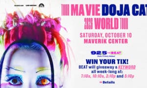 Promotional concert poster with colorful artwork and bold pink and blue text announcing a 2026 world tour at Maverik Center and a radio giveaway details.